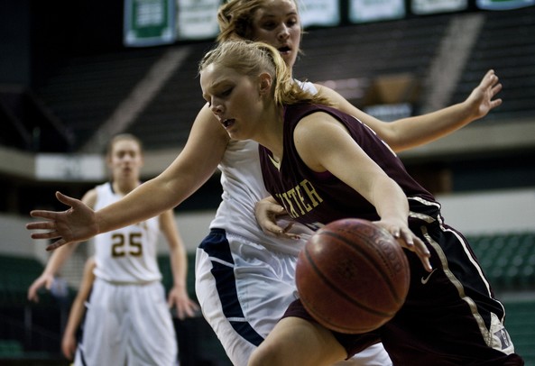 Dexter HIgh School sophomore Crystal Kedroske dribbles toward the rim in the game against Saline at the EMU Convocation Center on Friday Jan. 4. Daniel Brenner I AnnArbor.com